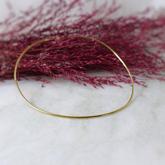 Ras de cou femme en or jaune maille oméga.