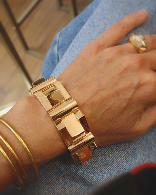 impotant bracelet tank des années 40 en or rose-