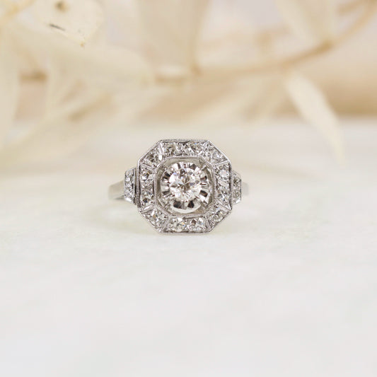 Bague art déco en diamant, pierre centrale sur panier cannelé et fil filigrané