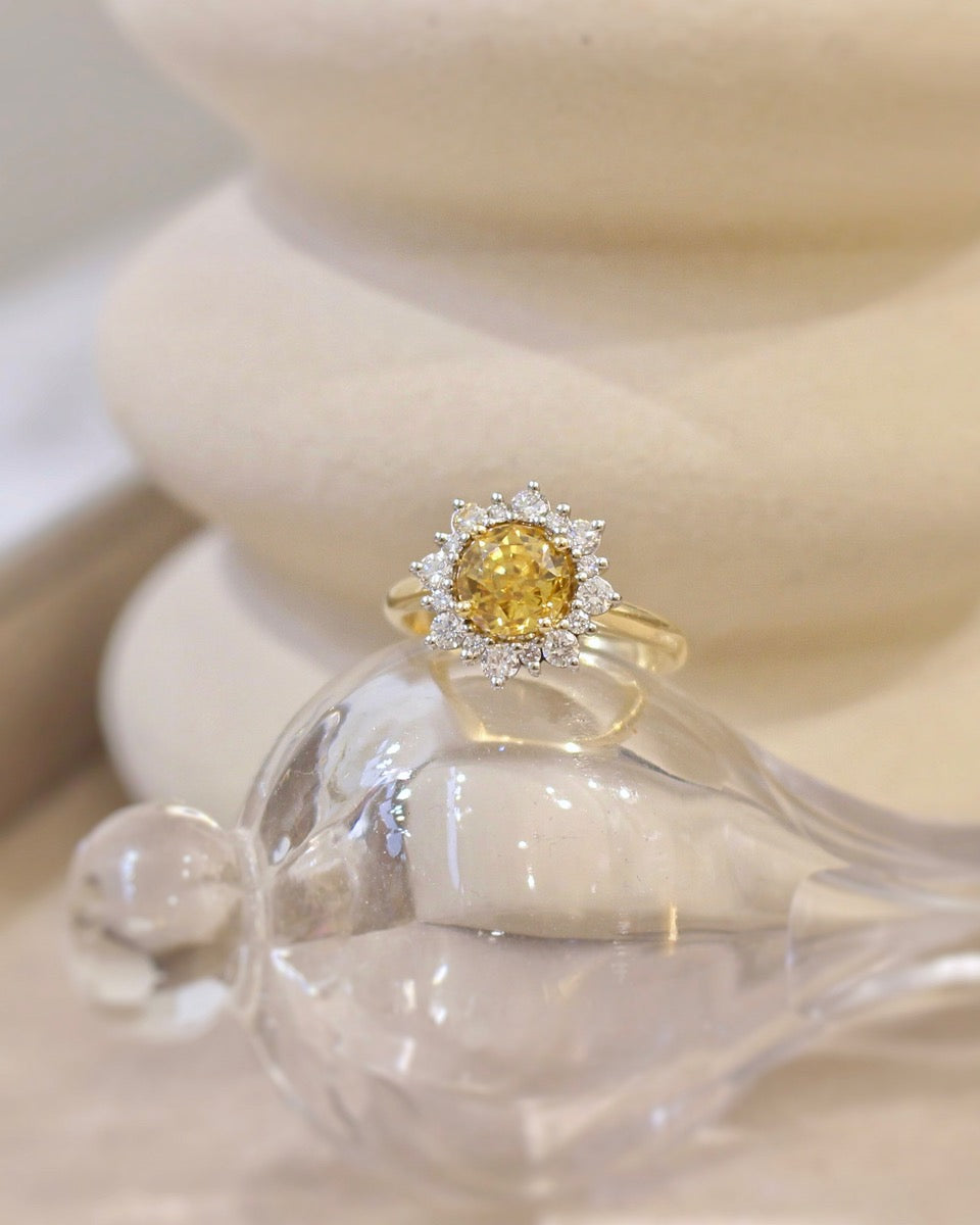 Bague entourage combolite diamants