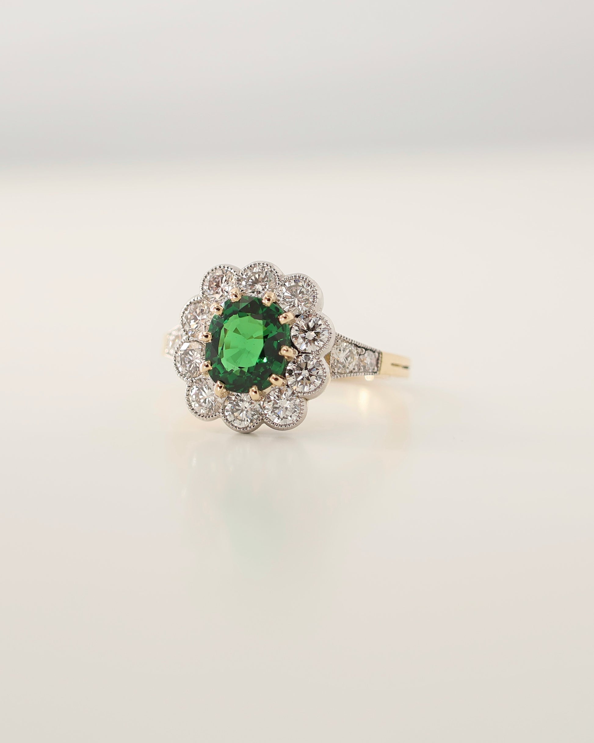Bague marguerite tsavorite diamants platine et or jaune