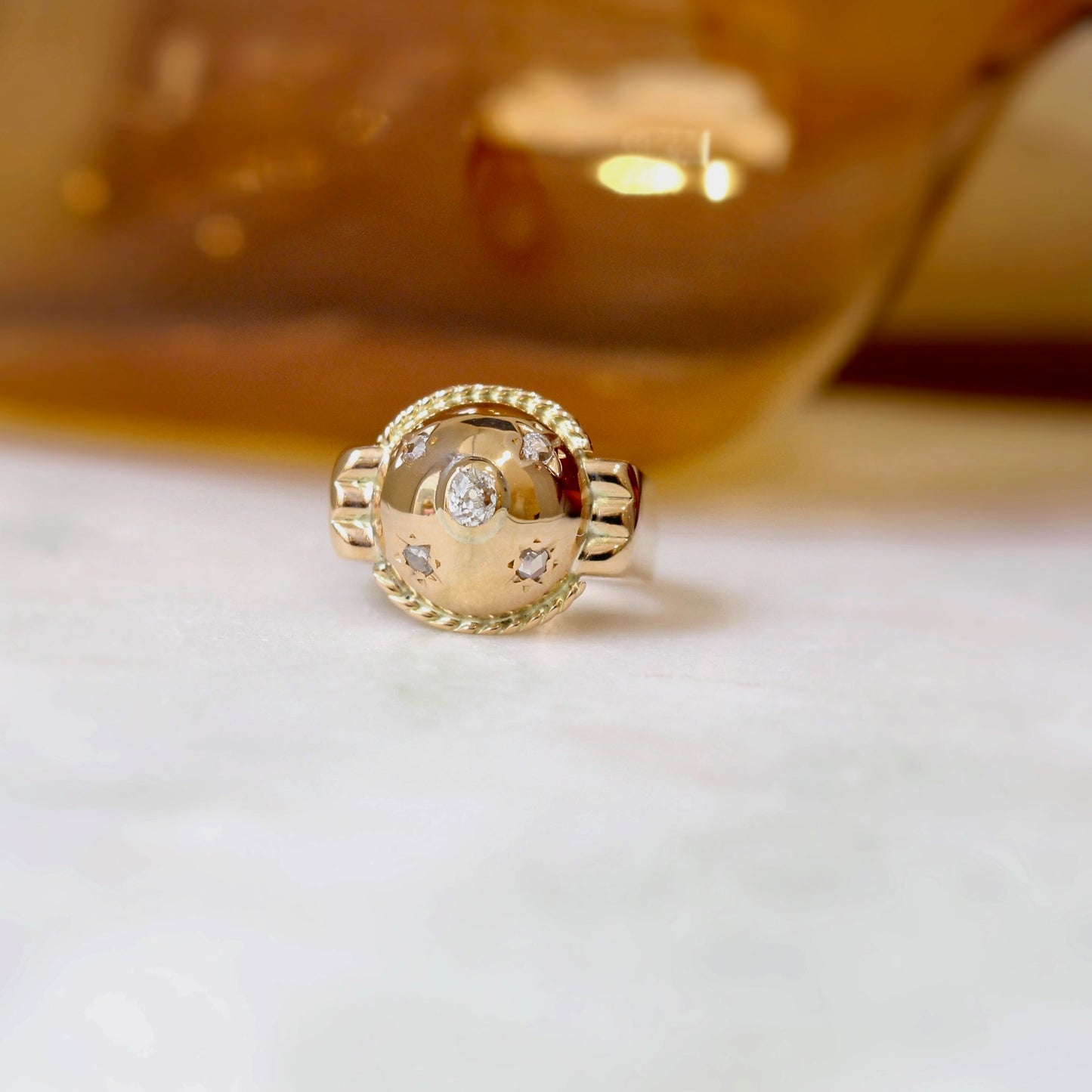 bague ancienne vers 1940-en or rose et diamants en serti étoilé