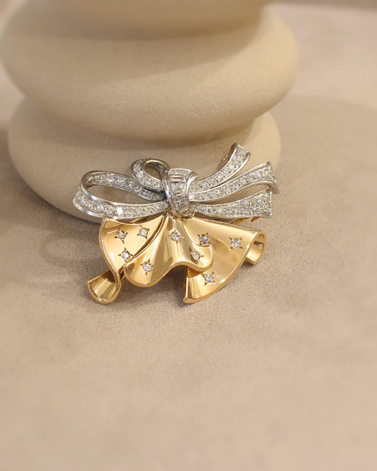 importante broche ancienne des années 40 - broche noeud - diamants sur or rose et platne